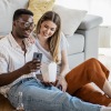 girl and guy looking at a phone